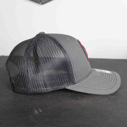 Stray Dog Strength Trucker Hat